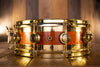 DW 14 X 5 COLLECTORS SPECIALITY EDGE BRASS MAPLE SNARE DRUM, AMBER OVER FLAME MAPLE, GOLD FITTINGS (PRE-LOVED)