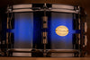 NOBLE & COOLEY 13 X 6.5 CD MAPLE SNARE DRUM, BLUE SPARKLE BURST GLOSS WITH BLACK CHROME FITTINGS