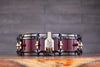 NOBLE & COOLEY 14 X 3.785 SS CLASSIC WALNUT SOLID SHELL PICCOLO SNARE DRUM, TRANSLUCENT RED GLOSS, BLACK CHROME HOOPS / BRASS LUGS