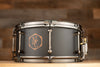 NOBLE & COOLEY 14 X 6.5 WALNUT PLY SNARE DRUM MATTE BLACK WITH WALNUT REVEAL BADGE AND BLACK CHROME FITTINGS