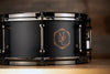 NOBLE & COOLEY 14 X 6.5 WALNUT PLY SNARE DRUM MATTE BLACK WITH WALNUT REVEAL BADGE AND BLACK CHROME FITTINGS