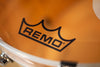 REMO POWERSTROKE 3 P3 COLORTONE ORANGE WITH HOLE (SIZES 18" TO 26")